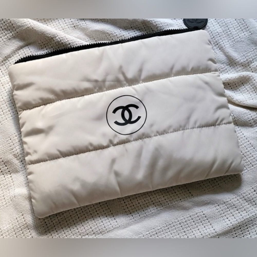 New rare and collectible puffy pouch,clutchor cosmetic bag with zipper in white